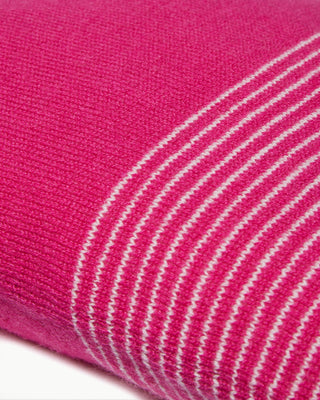 detailed view of the pink small striped dolce cashmere travel pillow with olive wood buttons|light