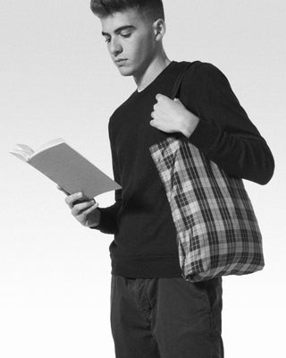 a man using the yellow aldine silk shopper|light