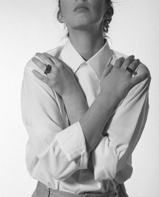 a woman wearing two gold plated brass Bembo rings|light