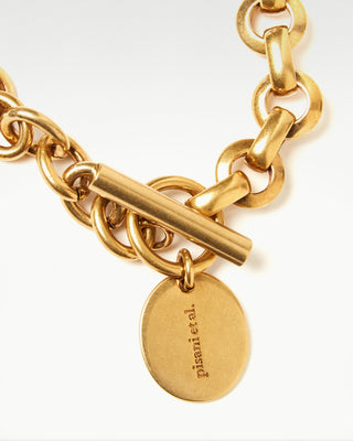 close up view of the gold plated brass Bembo bracelet|light