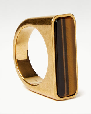 full view of the gold plated brass bembo ring with tiger eye semi precious stone|light