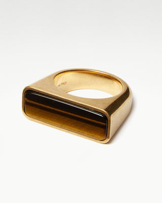 detailed view of the gold plated brass bembo ring with tiger eye semi precious stone|light