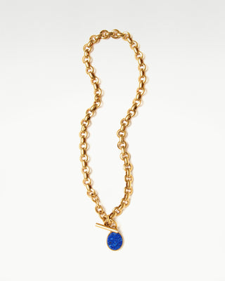front view of the gold plated brass bembo egg necklace with lapis lazuli semi precious stone|light