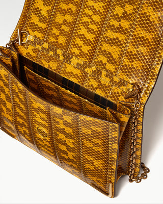 inside view of the yellow gala exotic snake skin satchel bag|light