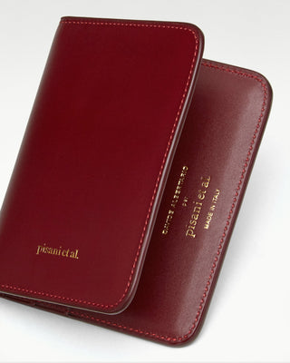 detailed view of the red luca leather bi fold wallet|light