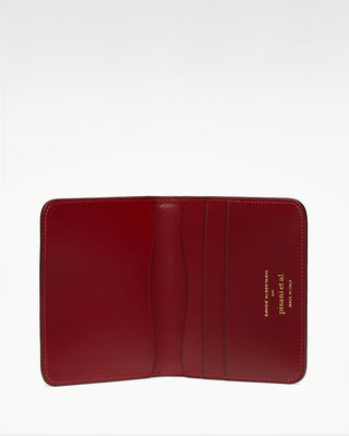 open view of the red luca leather bi fold wallet|light