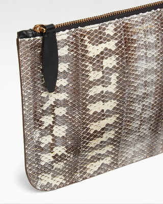 detailed view of the white vanni exotic snake skin zippered pouchh|light