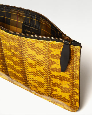 inside view of the yellow vanni exotic snake skin zippered pouch|light