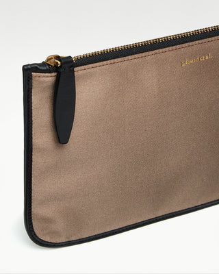 detailed view of the sand  vanni silk zippered pouch with a pocket|light