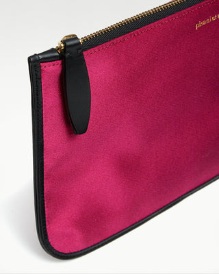 detailed view of the pink vanni silk zippered pouch with a pocket|light