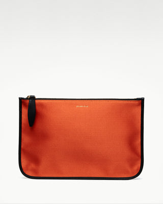 front view of the orange vanni silk zippered pouch with a pocket|light