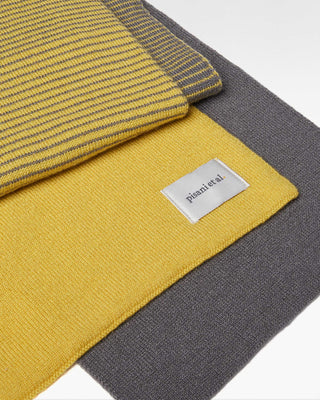 detailed view of the yellow pure cashmere striped jo scarf|light